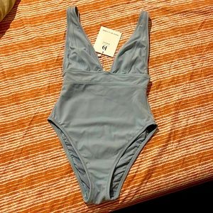 Brand new baby blue one piece swim suit from De Rococo size small